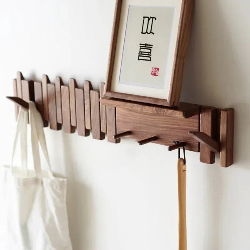 Wall-mounted coat rack featuring a unique piano key design, crafted from solid wood for durability and style, perfect for space-saving organization in entryways or hall 0